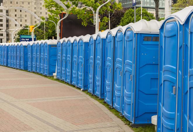 a row of sleek and modern portable restrooms at a special outdoor event in Fairborn, OH